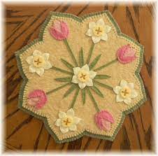 spring blossoms penny rug candle mat