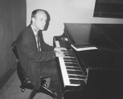Brian Eno playing the piano