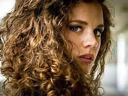While curly hair is a more carefree look that may not be the best for a job interview. Does Having Curly Hair Hurt Your Career