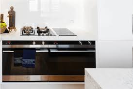 The cooktop manual does not say anything about junction box location, however the oven manual says they recommend the boxes be located in the cabinets on either side. Oven Buying Guide The Good Guys