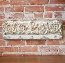 Distressed Hooked Scroll Wall Plaque