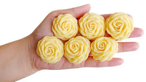 Some call this burnt fabric flowers. Yellow Roses On Hand Diy Project Made Out Of Fabric Flower Or Cloth Flower These Handmade Flowers Rose Yellow Color Are Great For Handicraft Project Diy Stock Photo Adobe Stock