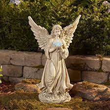 large garden angel statue holding solar