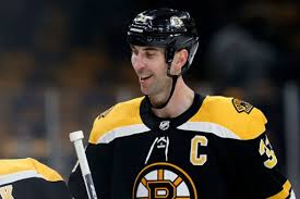 Chara is seen to be wearing a lime and cream colored striped shirt, brown pants and shoes. Zdeno Chara Named Bruins Nominee For 2019 Masterton Trophy