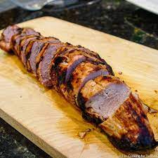grilled pork tenderloin on a gas grill