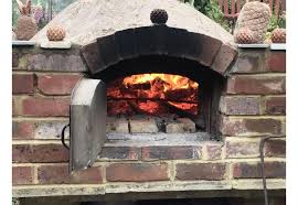 How To Use A Wood Fire Pizza Oven The