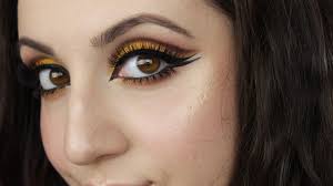 dramatic yellow cut crease makeup