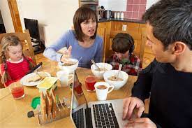 Family Using Gadgets Whilst Eating Stock Image Colourbox gambar png
