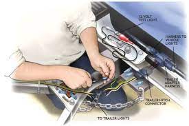 With two wires extending from trailer lights, the wires are ready for connection to a power source. Wiring Your Trailer Hitch