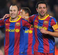 Answers on a postcard, please. Xavi And Iniesta Are Brothers In Arms London Evening Standard Evening Standard