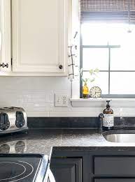 It adheres to ceramic tile or painted walls without peeling off. How Are They Holding Up Smart Tile Backsplash Review Little House Of Four Creating A Beautiful Home One Thrifty Project At A Time How Are They Holding Up Smart Tile