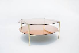 Modern round nesting coffee table 2 piece extendable gray black living room accent tables furniture. New Modern Furniture Lighting And Vase Collections Circular Coffee Table Coffee Table Brass Coffee Table