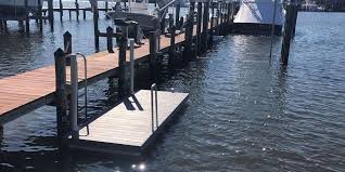 how do you keep a floating dock in place