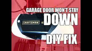 garage door opener won t stay down up