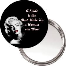 compact makeup on mirror with