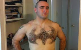man shaves batman logo into chest hair