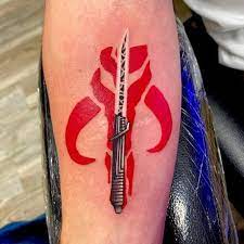 Krauze | Lightsaber tattoo, Mandalorian tattoo, Star wars tattoo