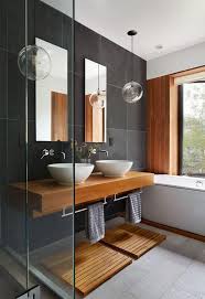 A plant gives a green, refreshing touch to contrast the clinical feel of white and gray tile. Industrial Style Bathrooms Plus Ideas Accessories You Can Copy From Them Bathroom Style Master Bathroom Design Simple Bathroom Beautiful Bathroom Designs