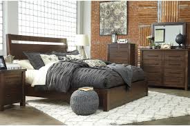 The furniture pieces are made from a variety of woods and in different shapes and sizes to match the rest of a set or have their own unique look. Starmore Queen Panel Bed Ashley Furniture Homestore
