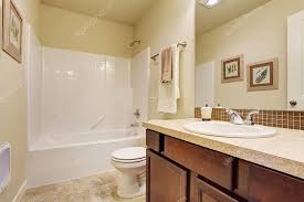 Soft Ivory Color With Tile Wall Trim