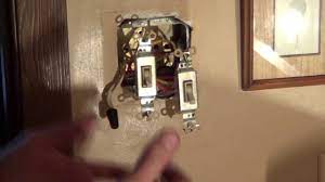 Attach the wires to the new light switch by tightening the screws. How To Wire A Double Switch Light Switch Wiring Conduit Youtube