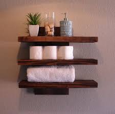 For those bathrooms that can't have toiletries hanging off the wall into the open space, there is a fantastic. Rustic Modern 3 Tier Floating Shelf Wall Mount Shelf By Keodecor 100 00 Bathroom Wall Shelves Rustic Towels Wall Shelves