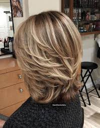 Pairing a caramel base color with blonde and auburn highlights will create a warm and radiant appearance. 29 Brown Hair With Blonde Highlights Looks And Ideas Southern Living
