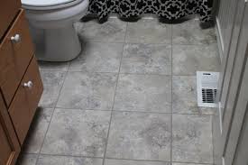 Installing vinyl plank flooring is an easy home renovation project that can totally change the look of a room. Trafficmaster Ceramica Cool Grey Vinyl Tile Bathroom Remodel Gabbiegillmer