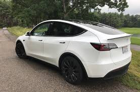 Solid black with ultra white interior. First Drive 2020 Tesla Model Y Performance The Detroit Bureau