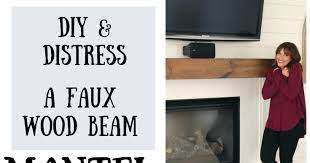 diy distress a faux wood beam mantel