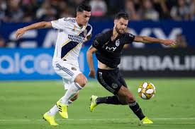 Sporting kansas city midfielder benny feilhaber, left, keeps the ball from los angeles fc forward carlos vela, right, during the first half of an mls clippers hope adjustments will improve outlook vs. How To Watch Sporting Kc Versus The La Galaxy The Blue Testament
