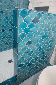 scallop shaped tile blue bathroom