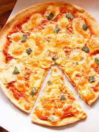 Make a simple pizza base, then top with tomato pizza sauce and mozzarella. Margherita Pizza Easy Homemade Recipe Dassana S Veg Recipes