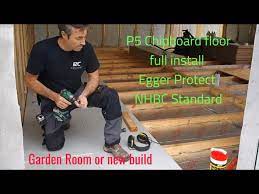 building a garden room laying chipboard