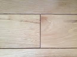 prefinished hardwood flooring vs