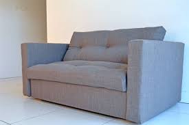 snug fully upholstered futon sofabed