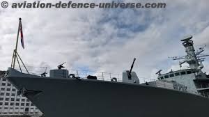 royalnavy ship hms iron duke docked in