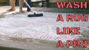 how to wash a rug on your driveway