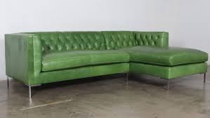 green leather sectional sofa with