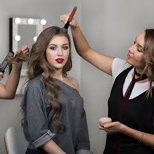 makeup artist hairstylist and model in