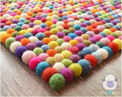 bright multicolor felt ball rug for