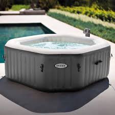 what to put under an inflatable hot tub
