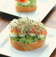 Slice the cucumbers very thin, and layer them over the salmon. Open Faced Egg Avocado Smoked Salmon Sandwich