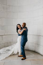 George street photo & video is a wedding photography and videography company with a photojournalistic style and trained team of wedding photography experts. Sunflowers Architectural Bliss At This Intimate New York Public Library Elopement Offbeat Bride