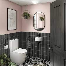 Edgy Bathroom With Black Tiles