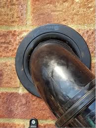 A Pipe Through A Brick Wall