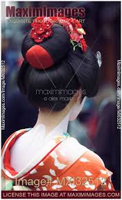 maiko geisha in bright red kimono back