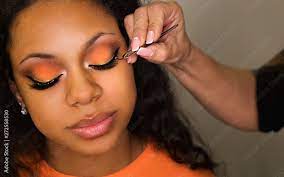 makeup artist sticks false eyelashes of