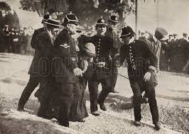 suffragettes being removed by police at