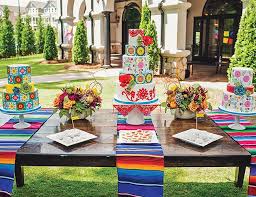 You can add a festive flair to your tables by adding piñata decor. Cinco De Mayo Inspired Wedding Ideas Inspired By This Cinco De Mayo Wedding Mexican Party Theme Mexican Theme Wedding